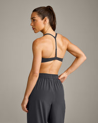 UnifiedMove™ T Back Minimal Bralette with Reflective Logo | Coal