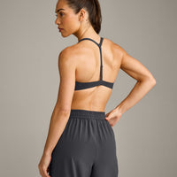 UnifiedMove™ T Back Minimal Bralette with Reflective Logo | Coal