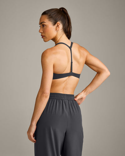 UnifiedMove™ T Back Minimal Bralette with Reflective Logo | Coal