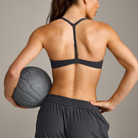 UnifiedMove™ T Back Minimal Bralette with Reflective Logo | Coal