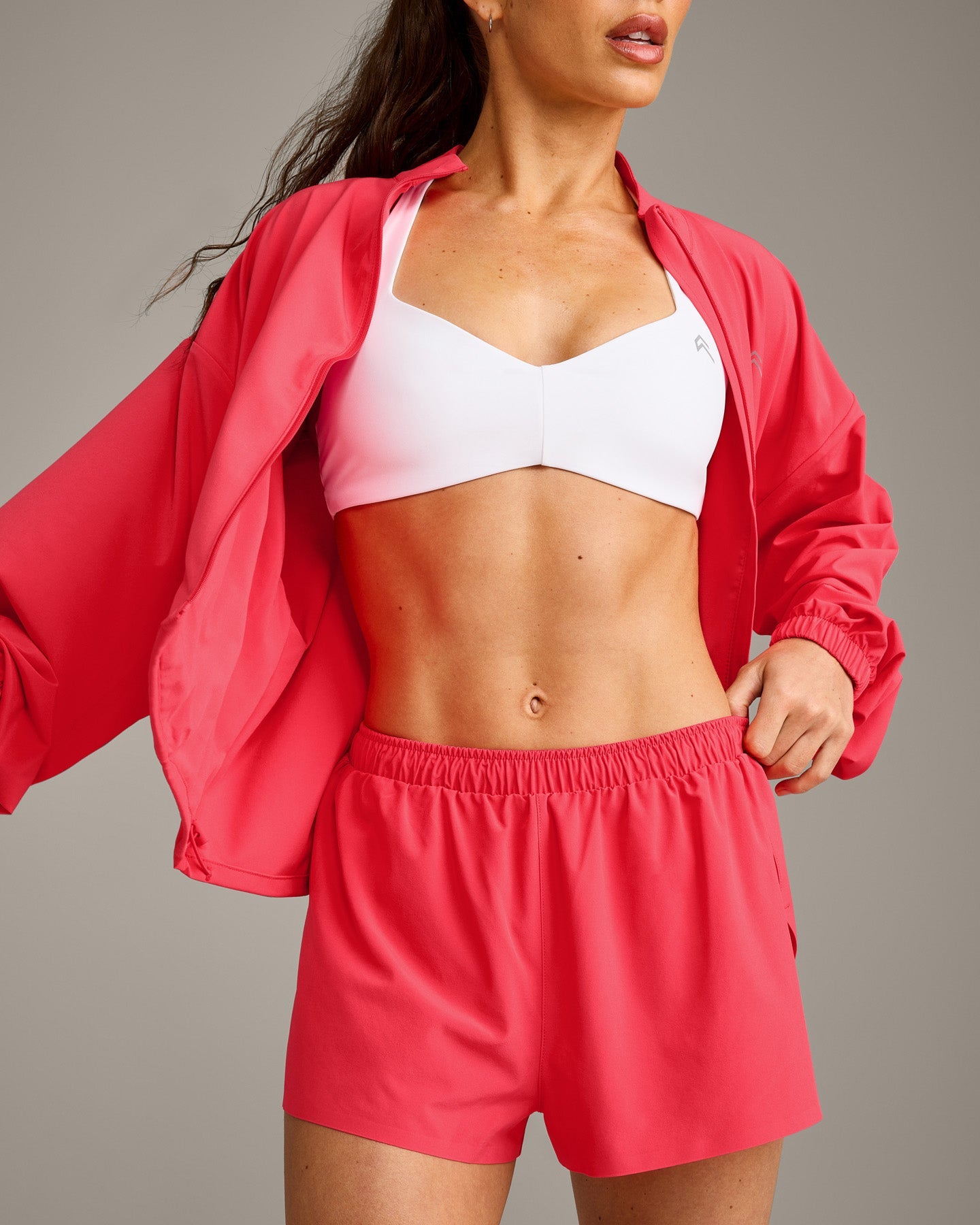 UnifiedMove™ T Back Minimal Bralette with Reflective Logo | White