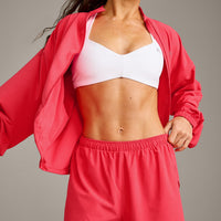 UnifiedMove™ T Back Minimal Bralette with Reflective Logo | White