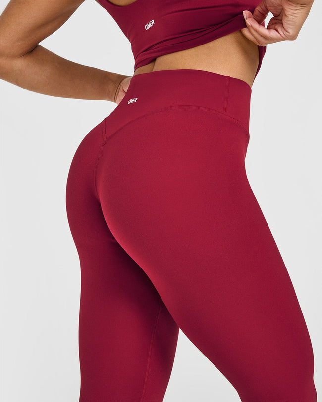 SoftMotion™ High Waisted Capri Leggings with White Logo | Ruby Red