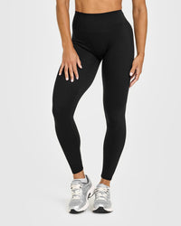 SoftMotion™ High Waisted Leggings with White Logo | Black