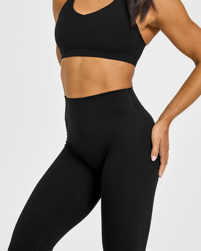 SoftMotion™ High Waisted Leggings with White Logo | Black