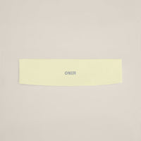 SoftMotion™ Headband with Gray Logo | Pastel Yellow