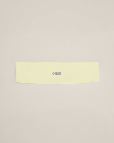 SoftMotion™ Headband with Gray Logo | Pastel Yellow