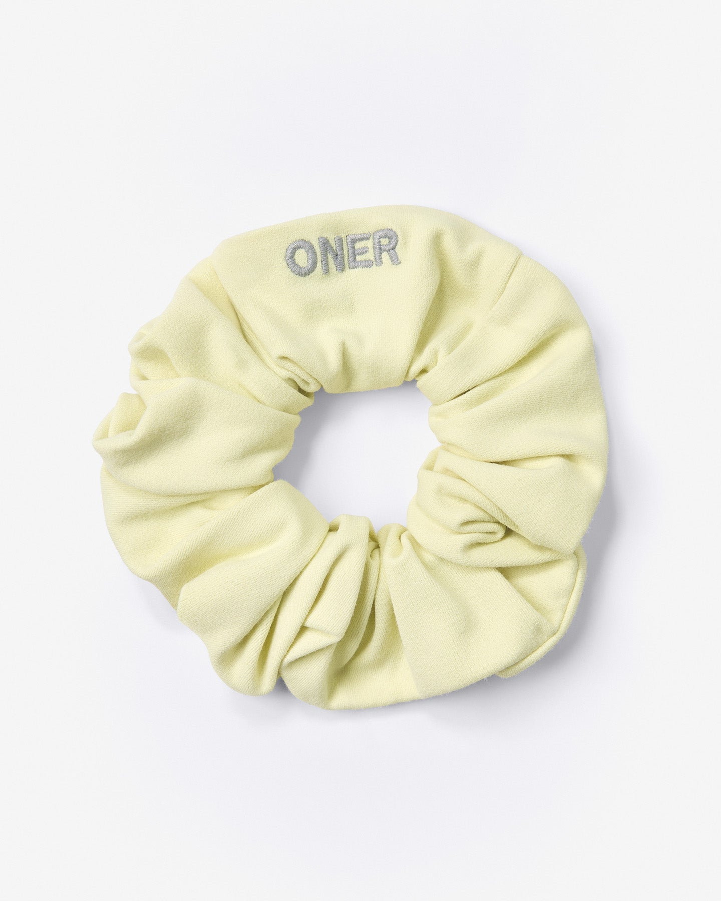SoftMotion™ Scrunchie with Gray Logo | Pastel Yellow
