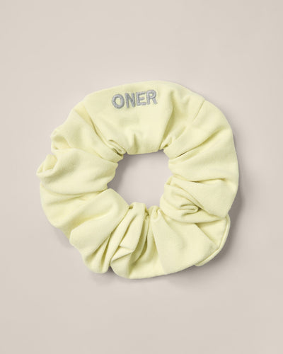 SoftMotion™ Scrunchie with Gray Logo | Pastel Yellow