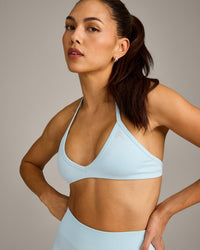 EnhanceLift™ Seamless Minimal Halter Neck Bralette with Gray Logo | Cloud Blue