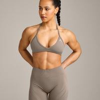 EnhanceLift™ Seamless Minimal Halter Neck Bralette with Gray Logo | Warm Minky