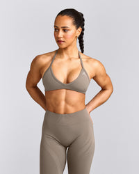 EnhanceLift™ Seamless Minimal Halter Neck Bralette with Gray Logo | Warm Minky
