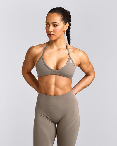 EnhanceLift™ Seamless Minimal Halter Neck Bralette with Gray Logo | Warm Minky