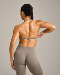 EnhanceLift™ Seamless Minimal Halter Neck Bralette with Gray Logo | Warm Minky