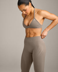 EnhanceLift™ Seamless Minimal Halter Neck Bralette with Gray Logo | Warm Minky