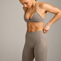 EnhanceLift™ Seamless Minimal Halter Neck Bralette with Gray Logo | Warm Minky