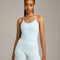 EnhanceLift™ Seamless Strappy Racer Tank Top with Built in Bra Shelf with Gray Logo | Cloud Blue