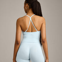 EnhanceLift™ Seamless Strappy Racer Tank Top with Built in Bra Shelf with Gray Logo | Cloud Blue
