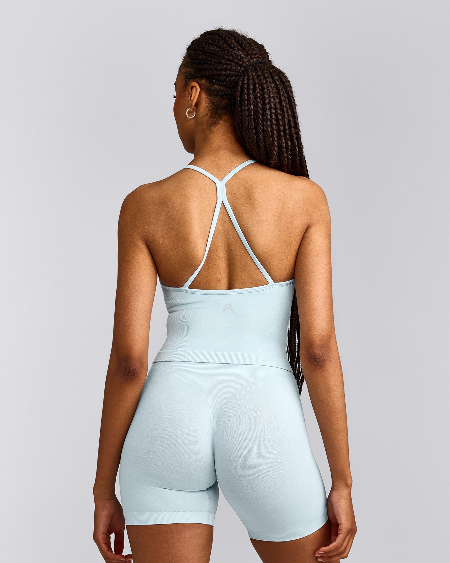 EnhanceLift™ Seamless Strappy Racer Tank Top with Built in Bra Shelf with Gray Logo | Cloud Blue
