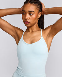 EnhanceLift™ Seamless Strappy Racer Tank Top with Built in Bra Shelf with Gray Logo | Cloud Blue