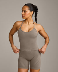 EnhanceLift™ Seamless Strappy Racer Tank Top with Built in Bra Shelf with Gray Logo | Warm Minky