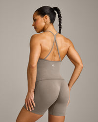 EnhanceLift™ Seamless Strappy Racer Tank Top with Built in Bra Shelf with Gray Logo | Warm Minky
