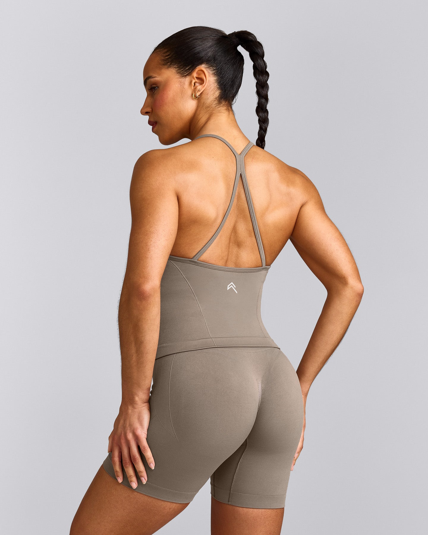 EnhanceLift™ Seamless Strappy Racer Tank Top with Built in Bra Shelf with Gray Logo | Warm Minky