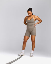 EnhanceLift™ Seamless Strappy Racer Tank Top with Built in Bra Shelf with Gray Logo | Warm Minky