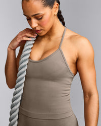 EnhanceLift™ Seamless Strappy Racer Tank Top with Built in Bra Shelf with Gray Logo | Warm Minky