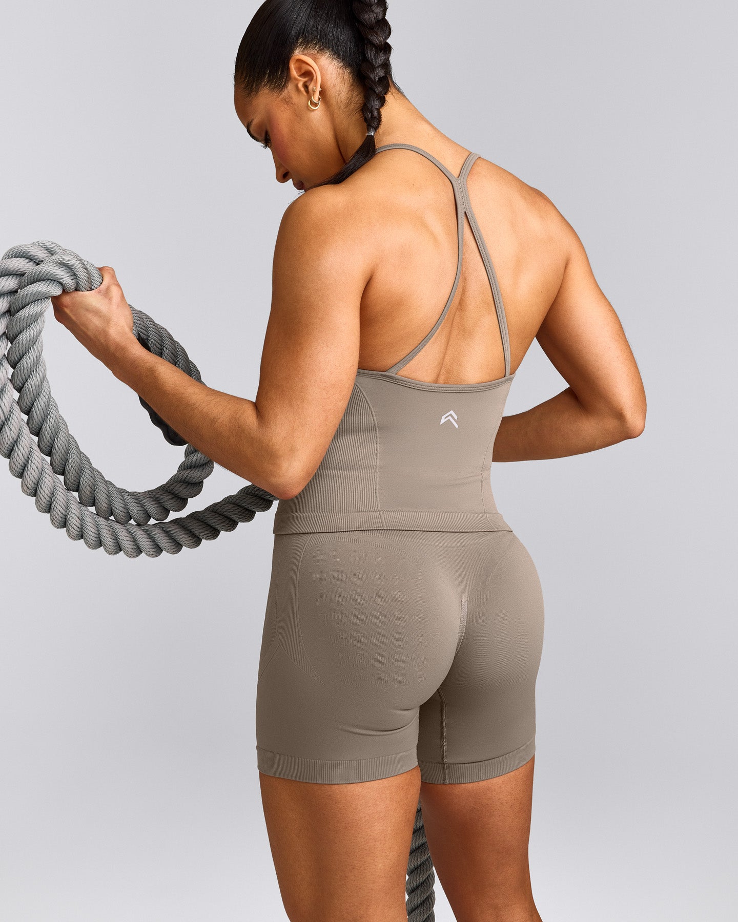 EnhanceLift™ Seamless Strappy Racer Tank Top with Built in Bra Shelf with Gray Logo | Warm Minky