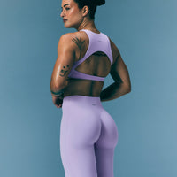 SoftMotion™ High Neck Sports Bra with Gray Logo | Lavender Purple