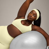 SoftMotion™ Bralette with Gray Logo | Pastel Yellow