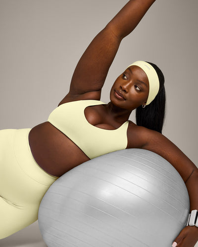 SoftMotion™ Bralette with Gray Logo | Pastel Yellow