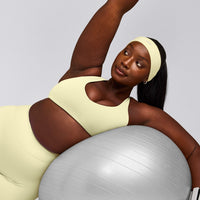 SoftMotion™ Bralette with Gray Logo | Pastel Yellow