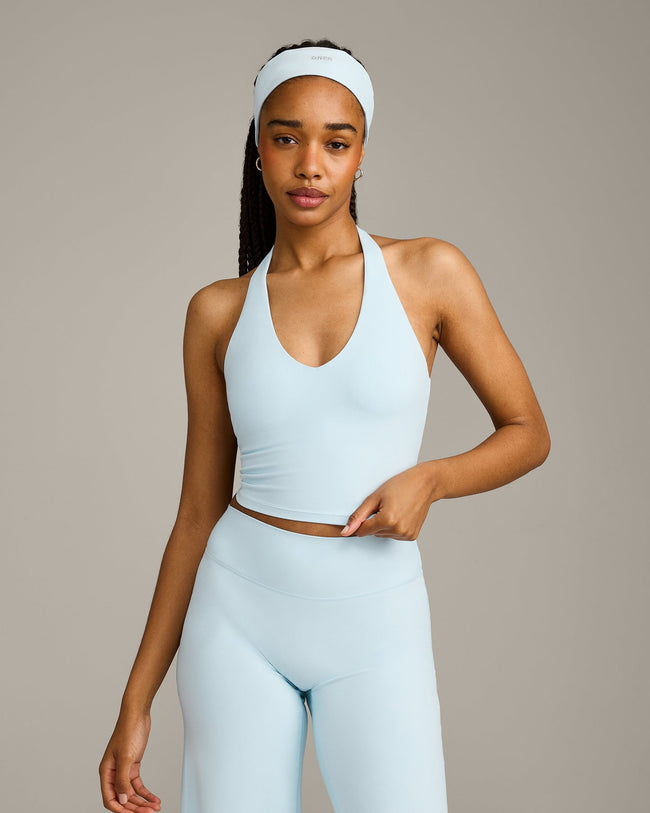 SoftMotion™ Halter Neck Mid Tank Top with Built in Bra Shelf with Gray Logo | Cloud Blue