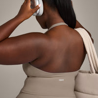 SoftMotion™ Halter Neck Mid Tank Top with Built in Bra Shelf with Gray Logo | Minky