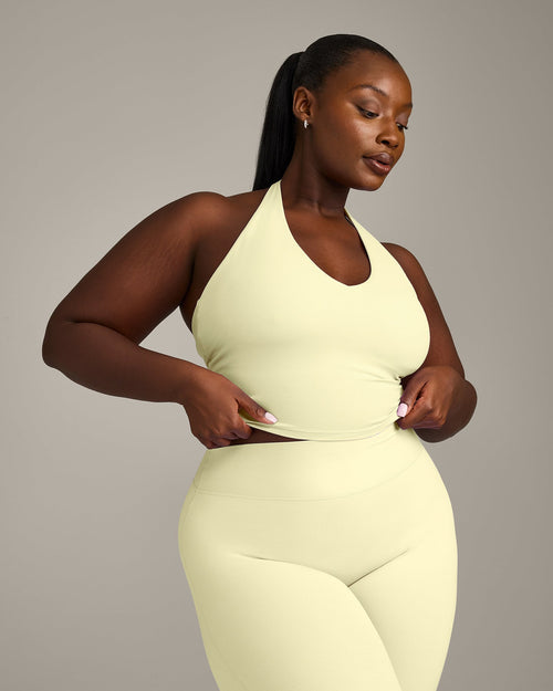 SoftMotion™ Halter Neck Mid Tank Top with Built in Bra Shelf with Gray Logo | Pastel Yellow