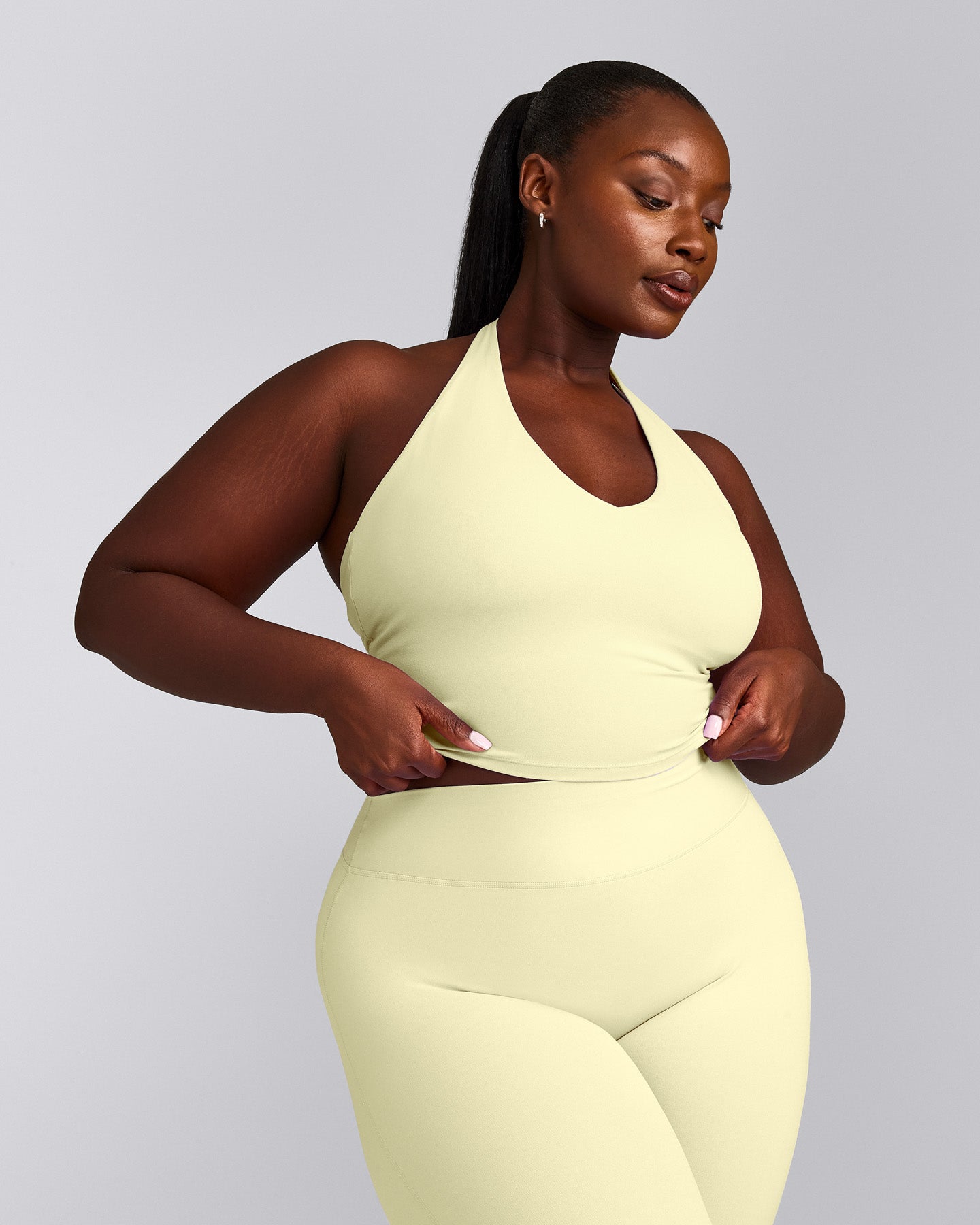 SoftMotion™ Halter Neck Mid Tank Top with Built in Bra Shelf with Gray Logo | Pastel Yellow