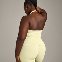 SoftMotion™ Halter Neck Tank Top with Built in Bra Shelf with Gray Logo | Pastel Yellow