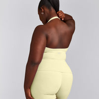 SoftMotion™ Halter Neck Tank Top with Built in Bra Shelf with Gray Logo | Pastel Yellow