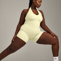SoftMotion™ Halter Neck Tank Top with Built in Bra Shelf with Gray Logo | Pastel Yellow