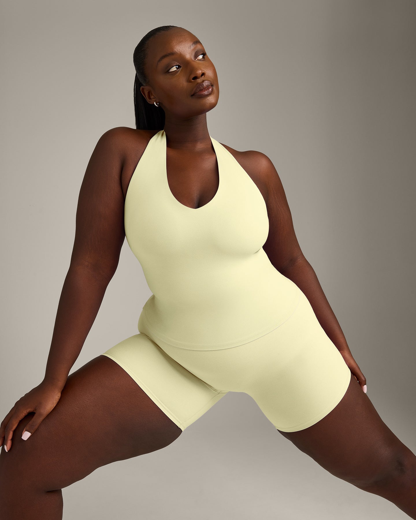 SoftMotion™ Halter Neck Tank Top with Built in Bra Shelf with Gray Logo | Pastel Yellow