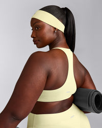 SoftMotion™ Headband with Gray Logo | Pastel Yellow