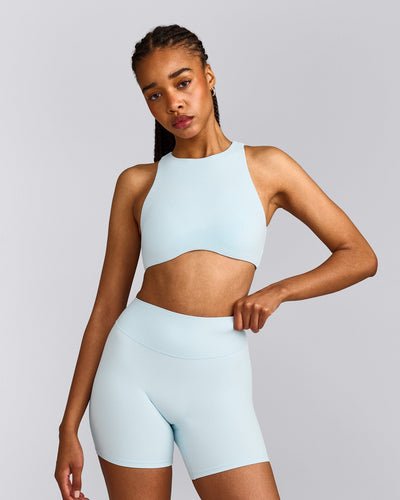 SoftMotion™ High Neck Sports Bra with Gray Logo | Cloud Blue