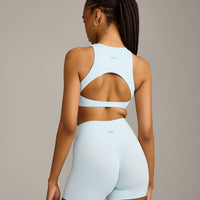 SoftMotion™ High Neck Sports Bra with Gray Logo | Cloud Blue