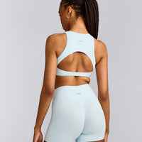 SoftMotion™ High Neck Sports Bra with Gray Logo | Cloud Blue