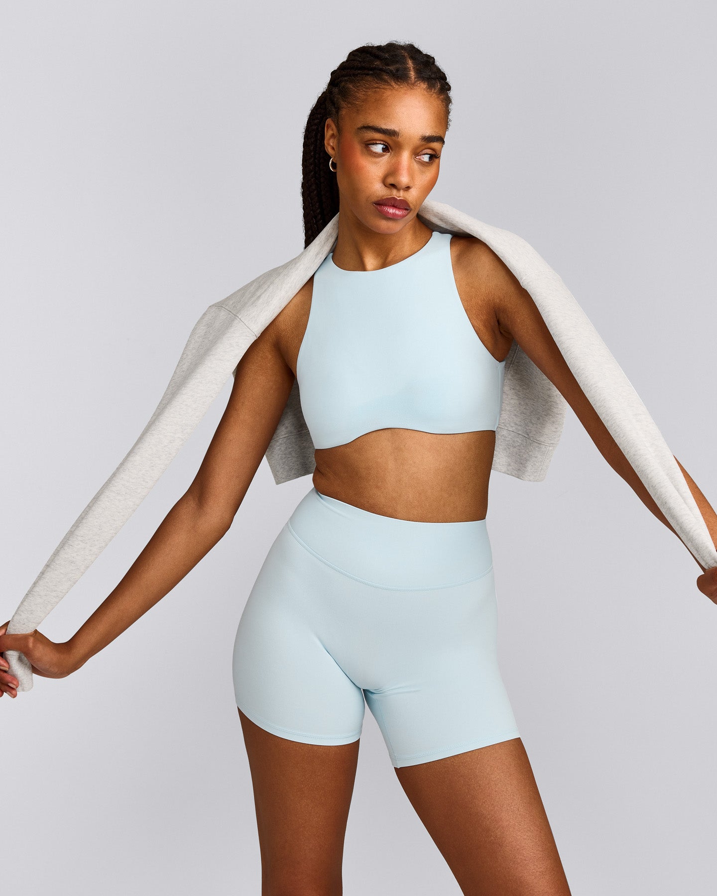 SoftMotion™ High Neck Sports Bra with Gray Logo | Cloud Blue