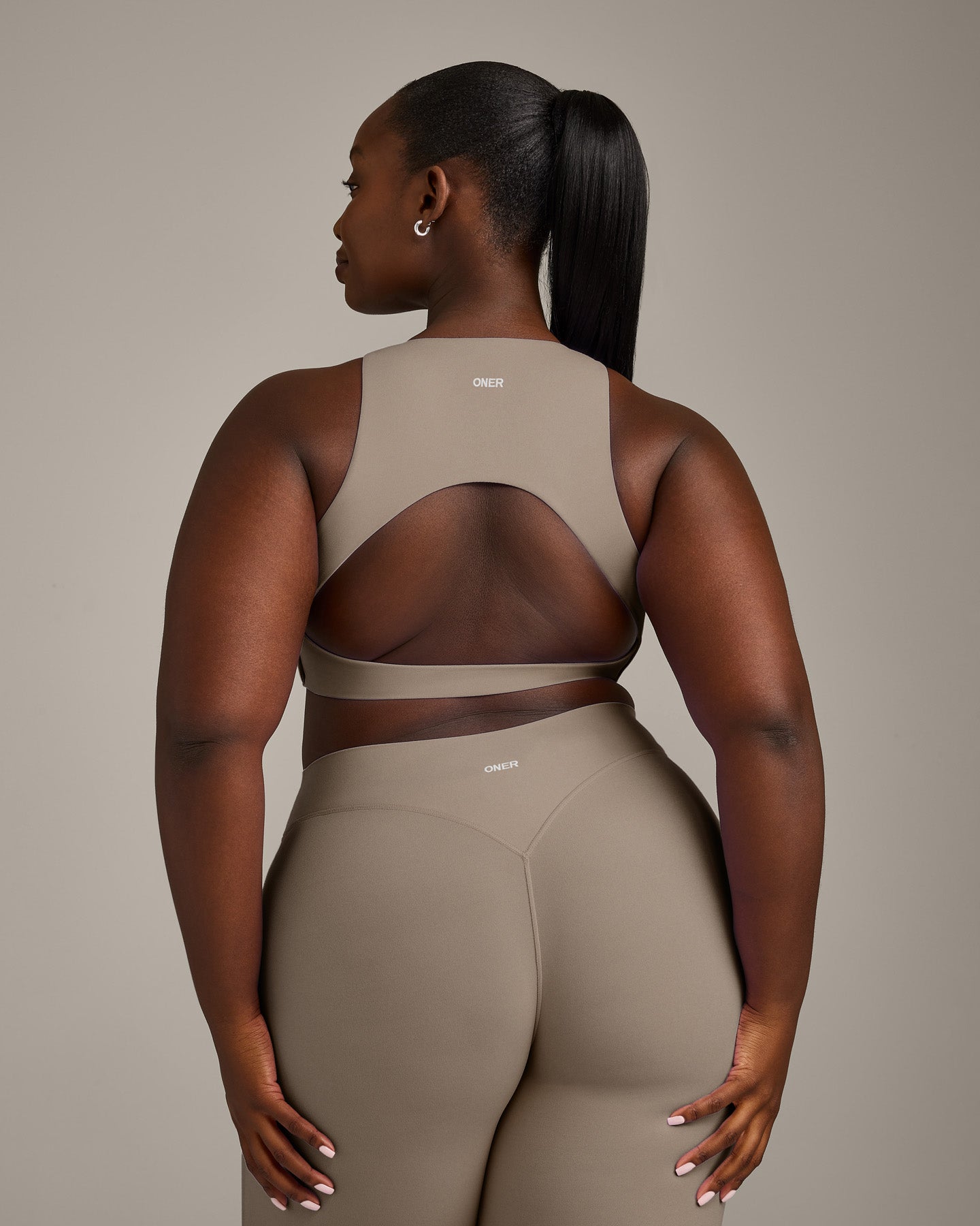 SoftMotion™ High Neck Sports Bra with Gray Logo | Minky