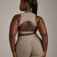 SoftMotion™ High Neck Sports Bra with Gray Logo | Minky