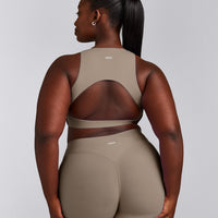 SoftMotion™ High Neck Sports Bra with Gray Logo | Minky